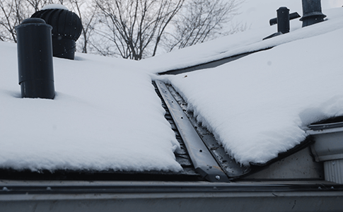 IceArmour on a snowy roof Prevent icicles and ice dams with heated gutter panels