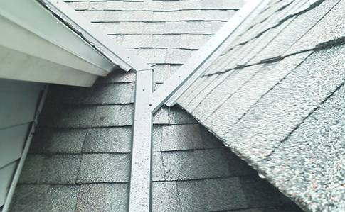 keep gutter guards clear of snow & ice with roof heating panels